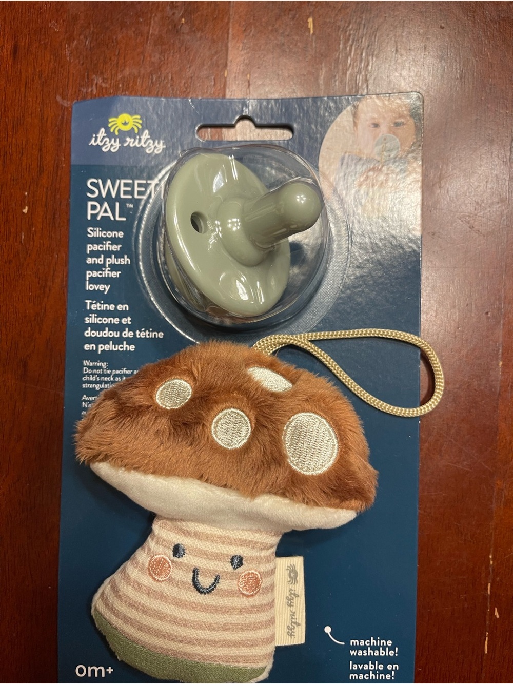 Itzy Ritzy Mushroom Pacifier Holder in Brown and Olive